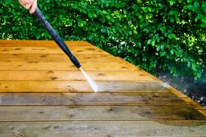 Curb Appeal Crew pressure washing